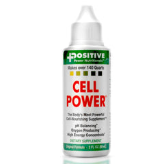 Positive Power Cell Power Drops bottle on a wood surface, suggesting daily wellness support.