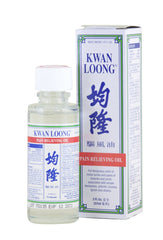 Application scene showing Prince of Peace Kwan Loong Oil for gentle massage.