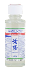 Kwan Loong Oil label with usage directions and safety notes.