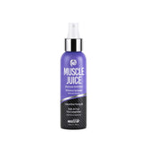Pro Tan Muscle Juice bottle under stage lights for defined shine