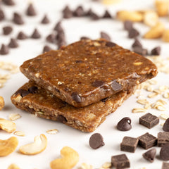 PROBAR Oatmeal Chocolate Chip cross-section reveals nuts, oats, and seeds.