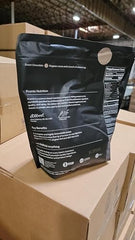 Promix Whey Isolate Chocolate scoop dispensing for quick, accurate protein boosts.