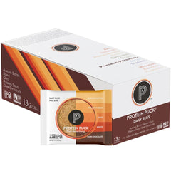 Protein Puck Daily Bliss case pack shows gluten-free vegan bars for on-the-go nutrition.