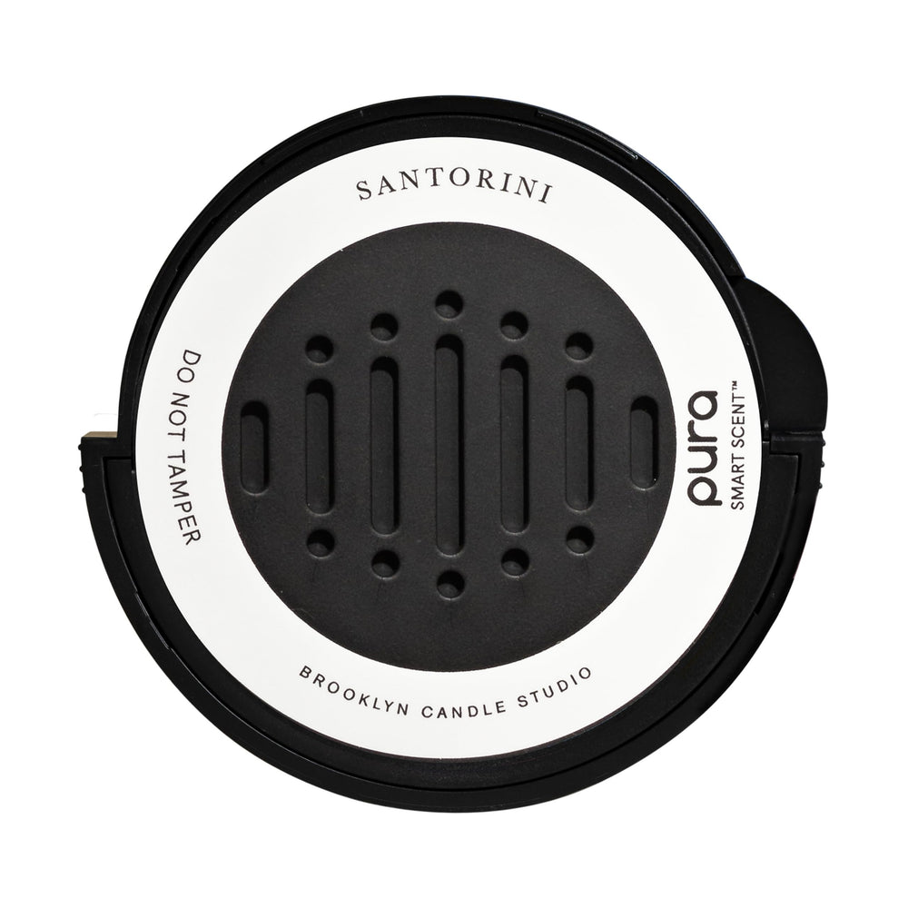 Pura Santorini car diffuser refill bottle for long-lasting in-car fragrance.