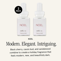 Pura Unify Noel diffuser dispense shown releasing clean fragrance for a welcoming space