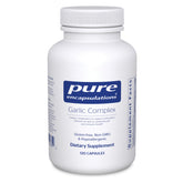 Pure Encapsulations Garlic Complex bottle on a kitchen counter for daily immune support.