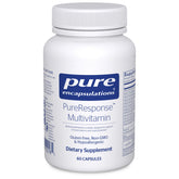 Pure Encapsulations PureResponse Multivitamin bottle on desk for immune balance.