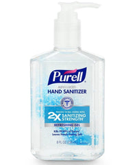 Purell Advanced Hand Sanitizer two-pack on table for quick disinfection in shared spaces.