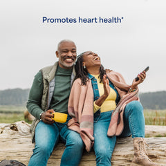 Puritan's Pride Lycopene bottle with heart icon suggests potential heart health support.
