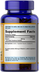 Puritan's Pride Vitamin E dl-alpha label close-up, helps identify the synthetic form for informed use.