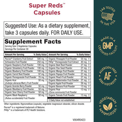Purity Products Super Reds capsules close-up highlighting organic berries and phytonutrients.