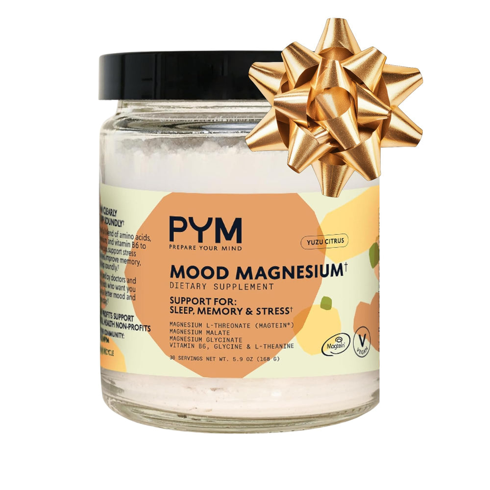 PYM Mood magnesium powder bottle label highlights vegan formula for daily calm support