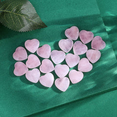 QINJIEJIE rose quartz heart palm stone ideal for grounding during daily rituals.