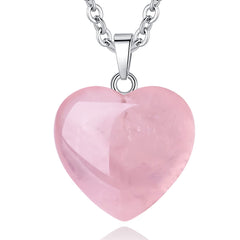QINJIEJIE Rose Quartz Heart pendant close-up, smooth surface ideal for meditation and balance.