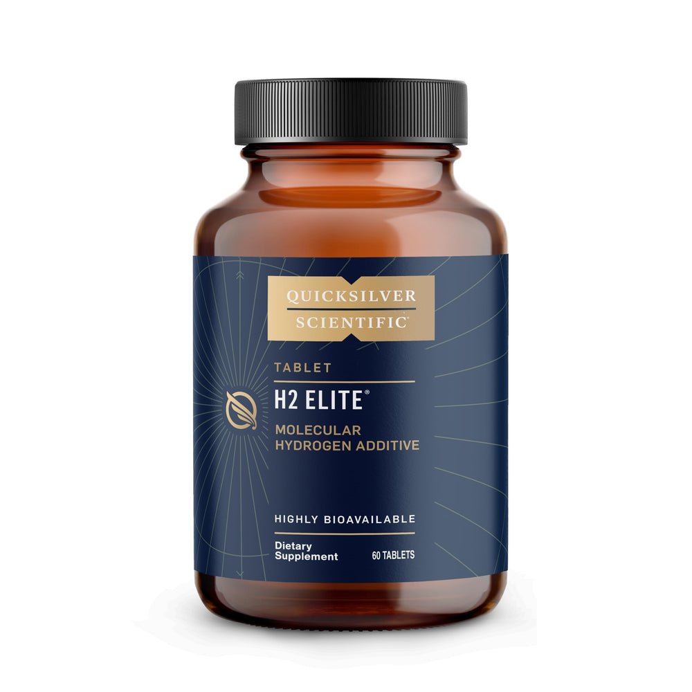 Quicksilver Scientific H2 Elite bottle pour demonstrates quick hydration in a glass.