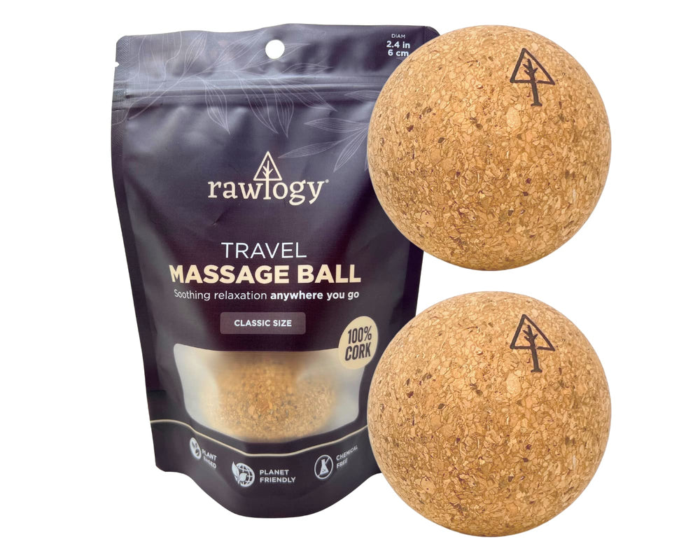 Rawlogy travel cork massage ball close-up showing textured cork for targeted self-massage.