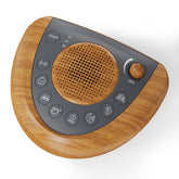 Raynic noise machine with wood grain design for a warm sleep environment.