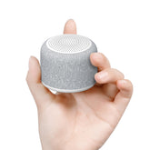 REACHER travel white noise front view showing compact sleep companion