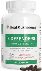 Real Mushrooms 5 Defenders capsules on white, showcasing adaptogenic blend for daily wellness.