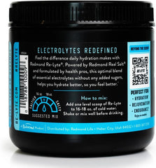 Redmond Re-Lyte scoop dissolving in water for quick mixing