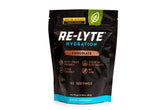 Redmond Re-Lyte chocolate scoop in water for refreshing hydration