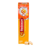 Redoxon Orange tablets poured into a glass for a refreshing vitamin C boost