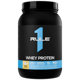 Rule 1 Whey Protein Banana Creme bottle front with 24 g protein per scoop highlighted for daily targets.