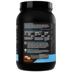 Rule 1 Whey Protein scoop dispensed shows easy dose for shakes.