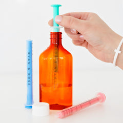 Ryan & Rose Cutie Dose bottom-reach feature captures the last drop.