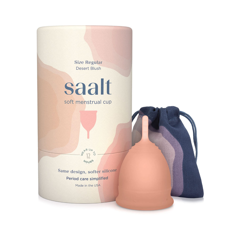 Saalt Soft cup in desert blush packaging, travel-ready for all-day protection.
