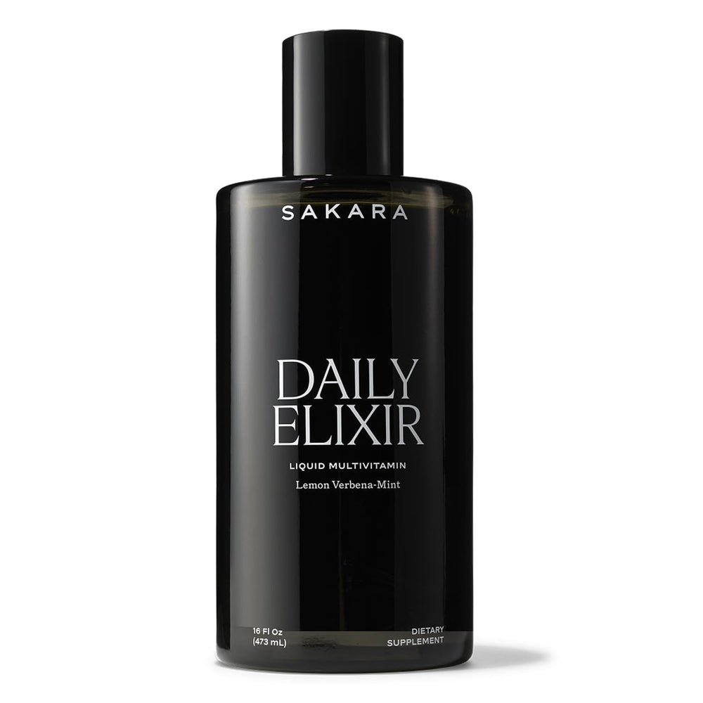 SAKARA Daily Elixir bottle being poured for convenient daily energy.