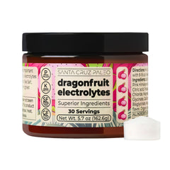 Santa Cruz Paleo dragon fruit electrolyte powder dissolving in water for refreshing hydration.