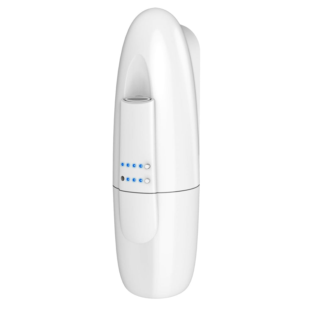 Scentiplus diffuser on a tabletop in white enhances room fragrance.