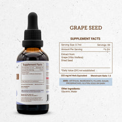 Grape seed tincture in a glass with droplets for easy dosing.