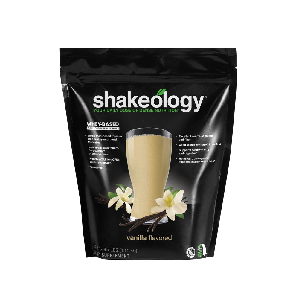 Shakeology Vanilla bottle showing gluten-free protein blend for balanced energy