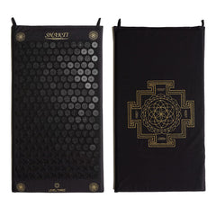 ShaktiMat acupressure mat setup with organic cotton cover for targeted tension relief