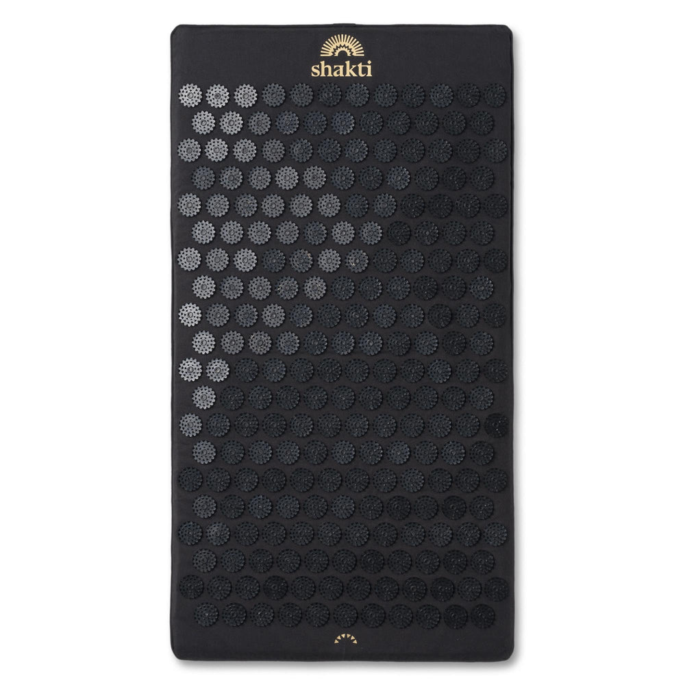 ShaktiMat Premium Acupressure Mat in Shakti Black, top view, promotes muscle relaxation.