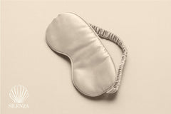 Silenza sleep mask worn to achieve complete darkness and comfort.