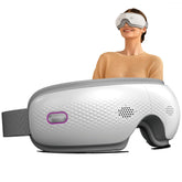 SKG Eye Massager with heat and music front view for soothing relaxation during breaks.