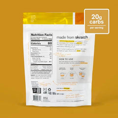 Skratch Labs Hydration Powder pineapple being poured into a glass during training