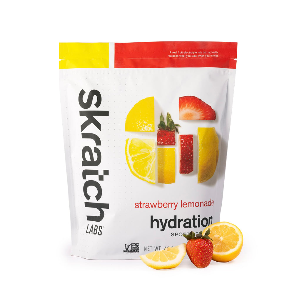 Skratch Labs Hydration Powder Strawberry Lemonade tub ready for mixing during workouts