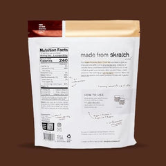 Skratch Labs Recovery Oat Milk Latte powder dissolving in water.