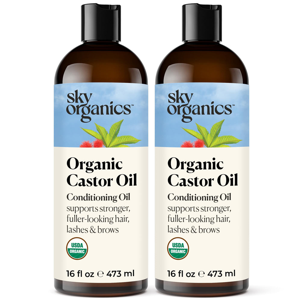 Sky Organics Castor Oil bottle pouring for scalp nourishment.