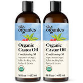 Sky Organics Castor Oil bottle pouring for scalp nourishment.