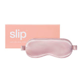 Slip pink silk sleep mask, front view, offering luxurious comfort and total light blockage.