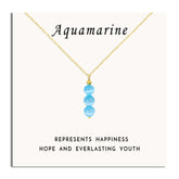 SmileBelle Aquamarine Necklace with blue beads elevates daily outfits.