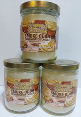 Smoke Odor Exterminator triple candle set on display for odor reduction.