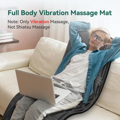 Snailax massage mat laid flat on a couch for full-body comfort.