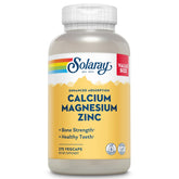 SOLARAY Calcium Magnesium Zinc bottle close-up highlighting vegan formula for bone support.
