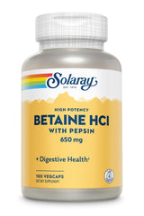 Pouring Solaray capsules from the bottle for post-meal use.